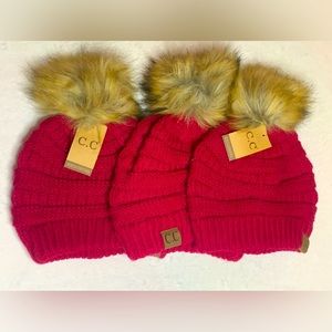 3 beanies with a puff